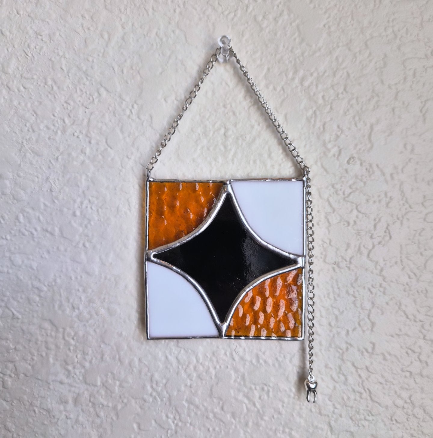 Star hanger with tooth charm