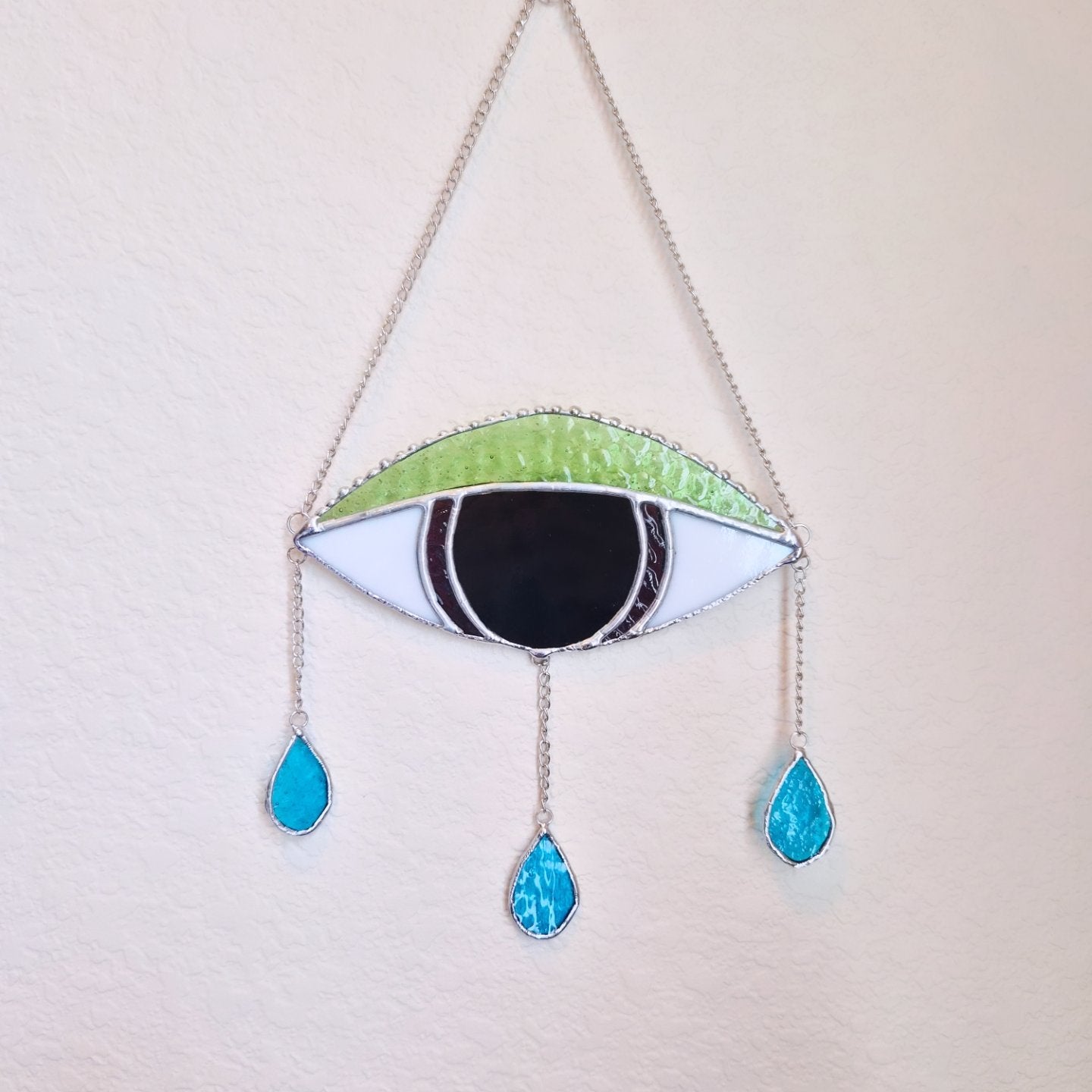 Crying eye hanger