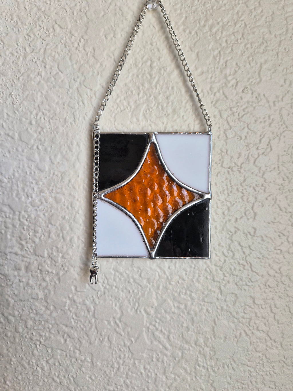 Star hanger with tooth charm