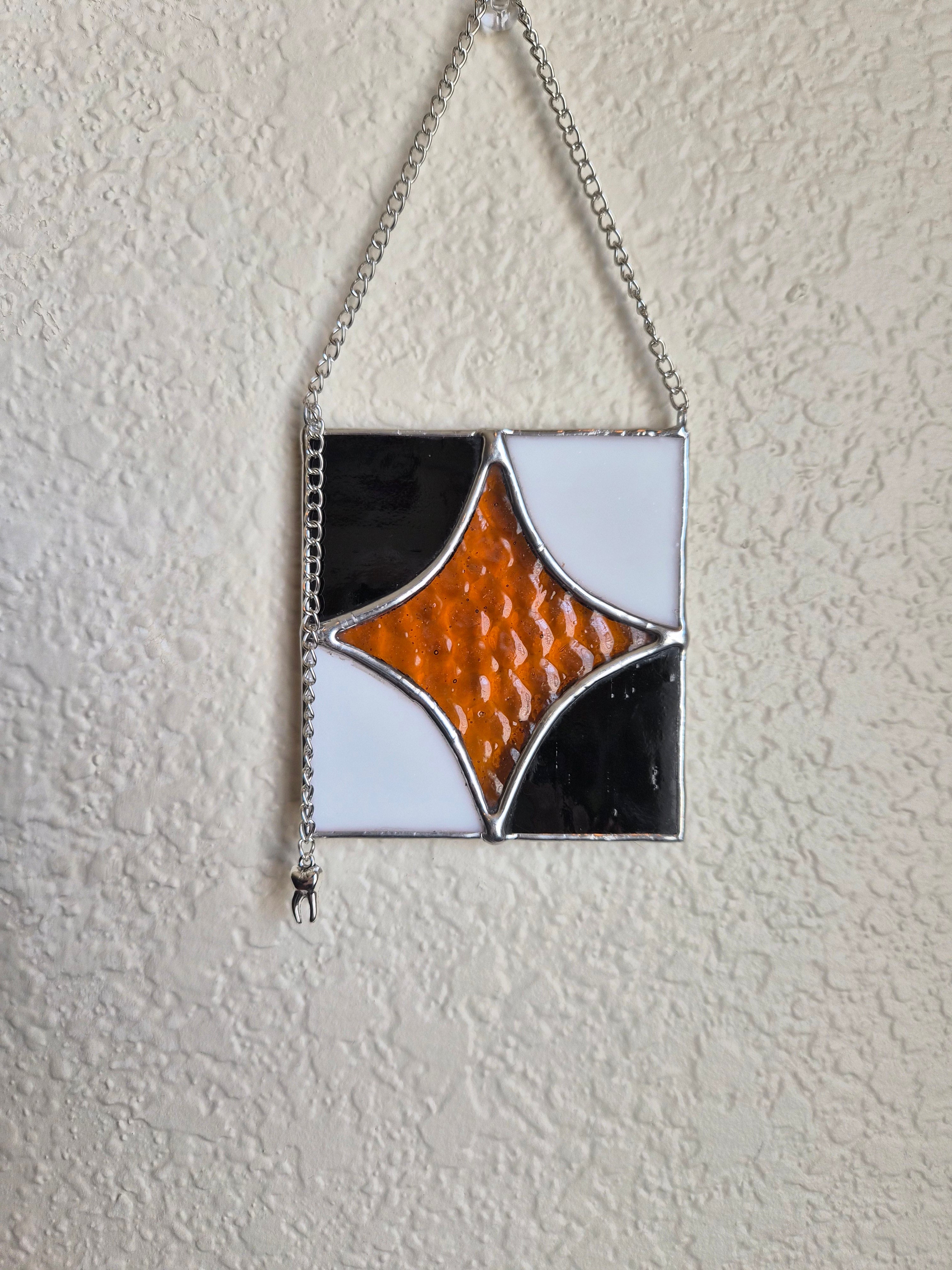 Star hanger with tooth charm