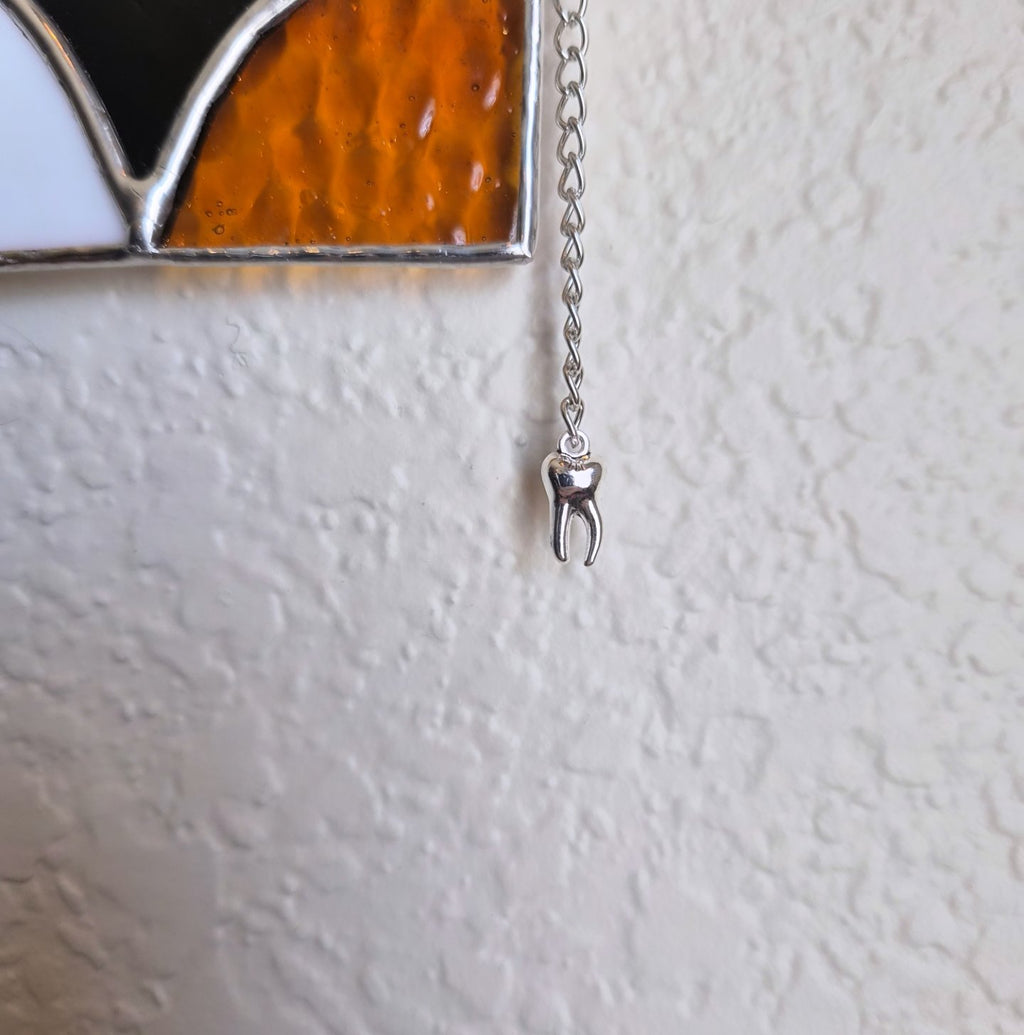 Star hanger with tooth charm